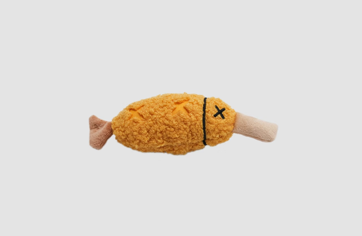 Grilled Fish treat-hiding plush pet toy
